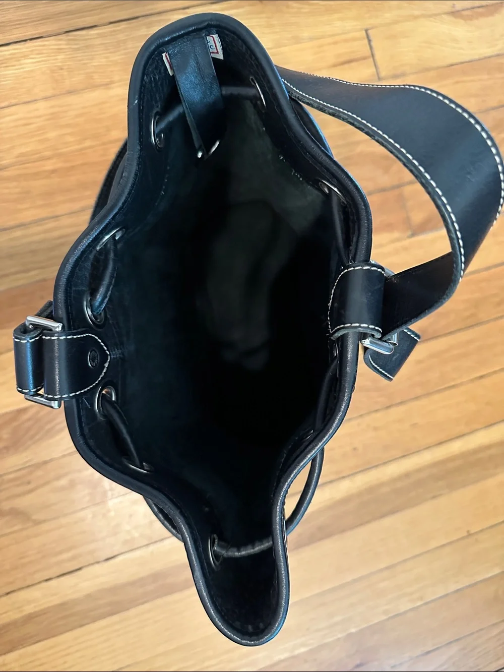 Dooney & Bourke Classic Vintage Black Leather Drawstring Sling Backpack